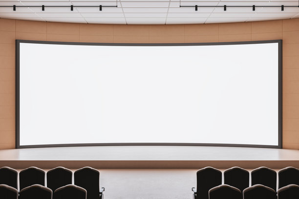空荡荡的礼堂，配有大型弯曲的空白屏幕和为会议或商业演示准备的舞台，室内现代灯光布置。3D渲染。图片下载
