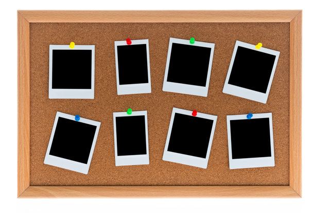 带有八张黑色即时打印照片的软木板图片下载