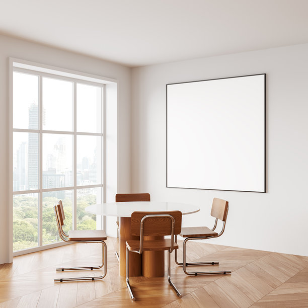 现代室内，墙上挂着空白海报框，圆桌旁有椅子。3D渲染图。图片下载