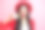 疯狂女孩咬仙人掌的照片肖像，背景为柔和的粉色。图片下载