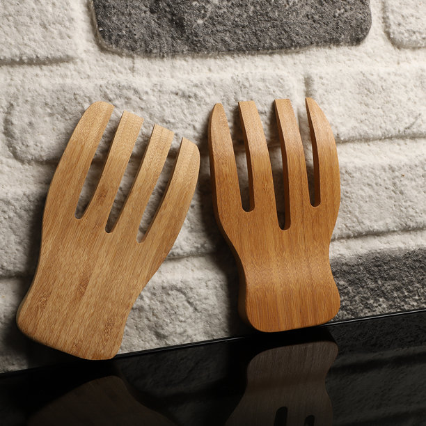木制沙拉夹，竹制厨房用具，概念拍摄。电子商务照片。图片下载