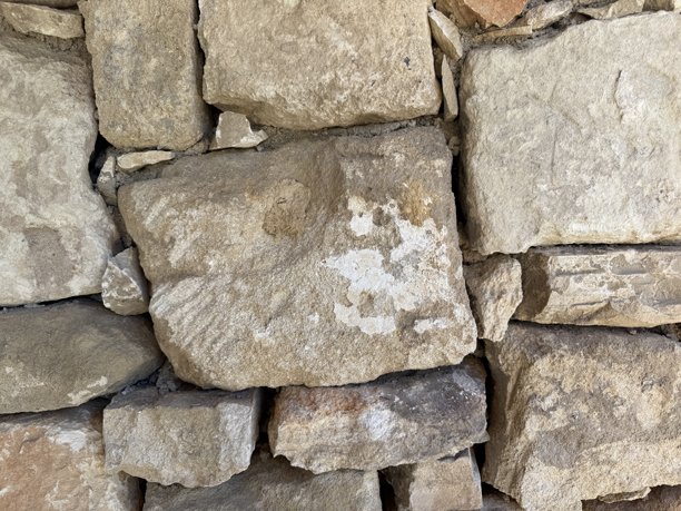 石墙照片，纹理背景。乡村风格石墙的特写。图片下载