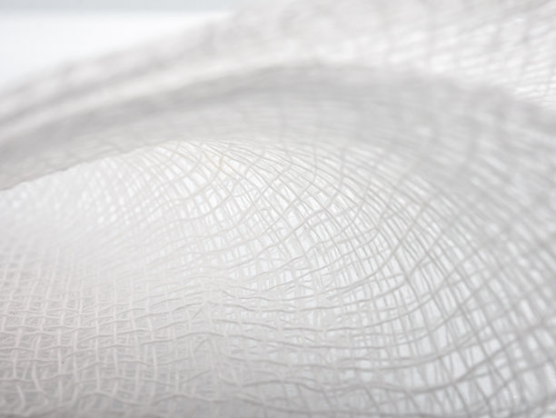 特写白色医用绷带的细节和纹理编织图案背景，微距照片细节的绷带编织纤维，壁纸图片下载