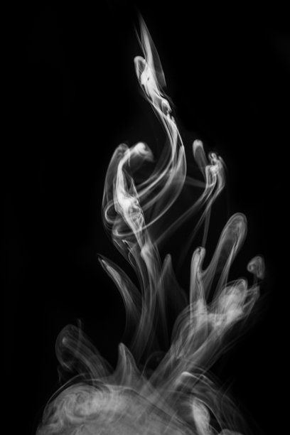 蒸汽、烟雾、气体在黑色背景上孤立。用于蒙太奇、叠加或纹理的图形资源，经过调色。旋转、扭动的烟雾可叠加在您的照片上。适合万圣节的烟雾效果。图片下载