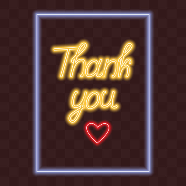 带有心形装饰的“谢谢”字母，呈矩形框架，霓虹光芒，作为墙上的标志或图片图片下载
