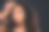 年轻女子进行美容护肤，将护肤精华液涂抹在精致的肌肤上，展现健康容光焕发的肤质图片下载