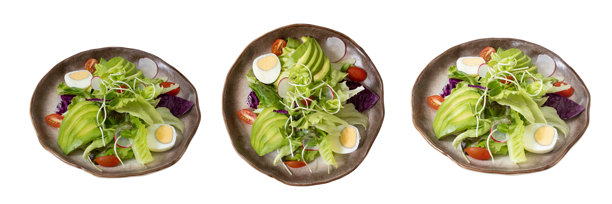 新鲜沙拉三重奏：一张极具视觉吸引力的照片，捕捉了三种色彩鲜艳的沙拉，它们被巧妙地摆放在乡村风格的盘子里，每种沙拉都充满了新鲜的绿叶蔬菜、五颜六色的蔬菜和诱人的食材。图片下载