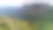 壮丽的云彩和郁郁葱葱的绿色山丘的山地景观图片下载