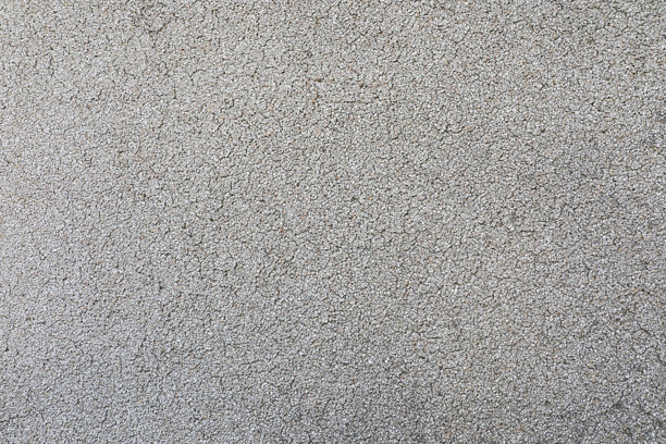 粗糙的灰色鹅卵石墙壁纹理，可用作背景或设计素材图片下载