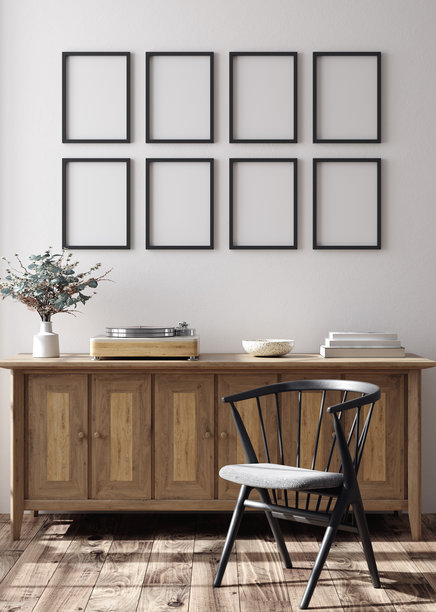 舒适的室内环境，配有复古家具和干花束的样机画框图片下载