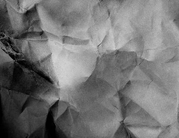 灰色纸张背景的黑白照片图片下载