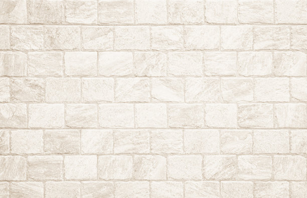 现代奶油色砖墙背景照片细节。棕色浅砖墙纹理背景，用于石砖块涂料设计。图片下载