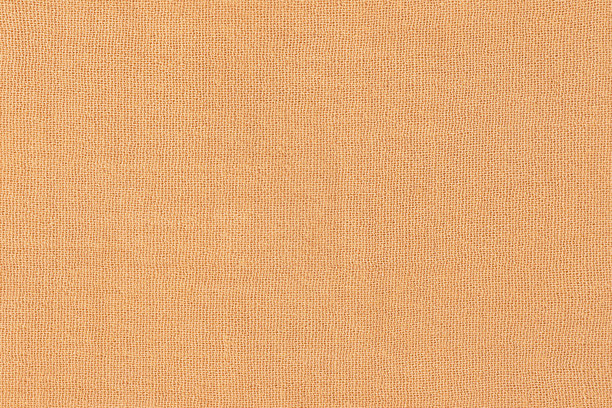 米色织物纹理的宏观照片，用作背景。图片下载