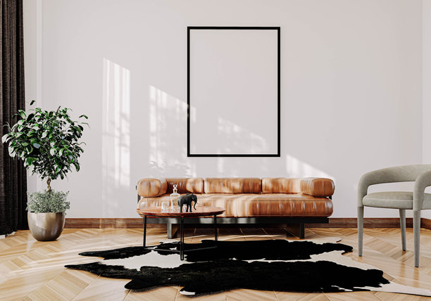 带有时尚沙发和墙上空白样机画框的3D室内渲染图。非常适合展示艺术品、印刷品、海报或室内设计和装饰概念。图片下载