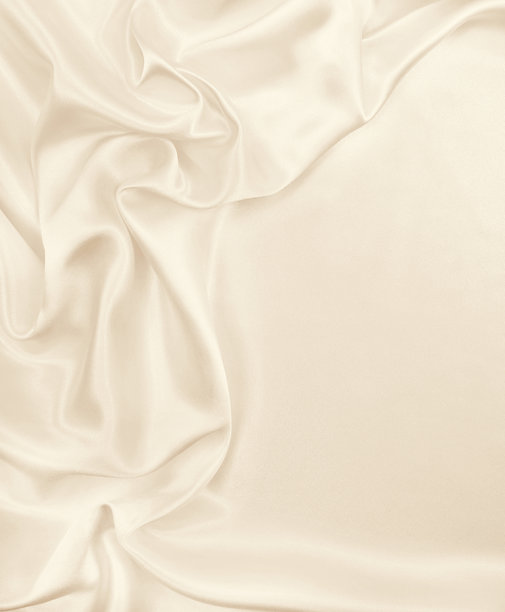 光滑优雅的金色丝绸或缎面奢华布料纹理，用作婚礼背景。奢华的圣诞节背景或新年背景设计。采用棕褐色调。复古风格图片下载