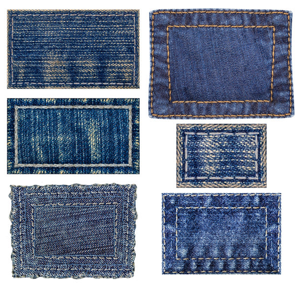 白色背景上孤立的各种蓝色牛仔布料拼布照片。图片下载