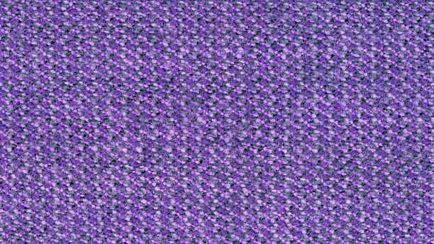 用于背景的织物纹理特写照片。织物由紫色、灰色和白色纱线混纺而成。合成纤维和羊毛的混合物。抽象图案。图片下载