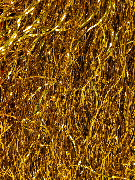 金色金属闪光纹理抽象背景，闪亮的圣诞花环，节日派对装饰，复古箔带，黄色假日图片下载