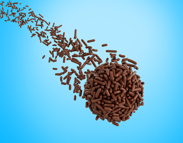 巧克力碎屑飘落在巴西布里加迪罗甜点球上，3D插画图片下载