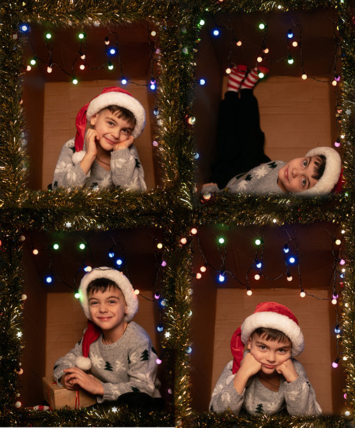 一个穿着针织毛衣和圣诞帽的小男孩坐在一个用节日彩灯装饰的纸板箱里，这是四张照片组成的圣诞拼贴画。图片下载