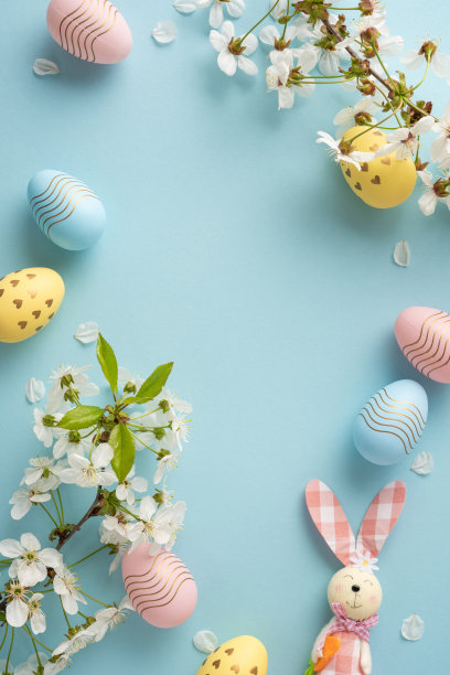 充满活力的垂直复活节场景，包含粉彩彩蛋、白色花朵和一只友好的兔子。非常适合复活节祝福、春季庆祝活动和季节性素材图片，背景为柔和的蓝色。图片下载
