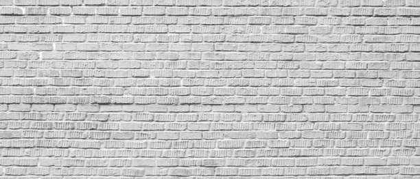 抽象的灰白色砖墙纹理，适用于图案背景。宽幅全景图片。黑色墙面纹理粗糙背景，深色混凝土旧污垢背景，网页横幅模板图片下载