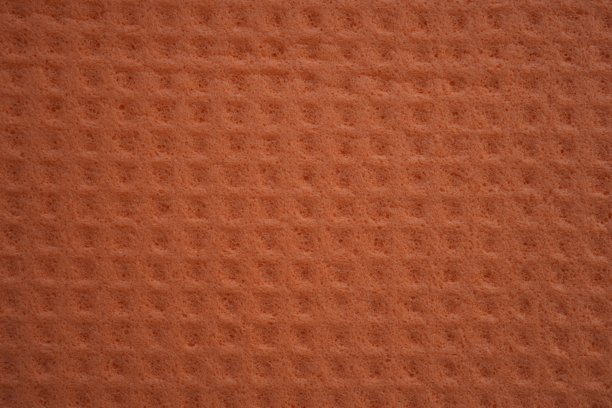 橙色海绵纹理特写，粉色抽象海绵纹理作为背景照片叠加图片下载