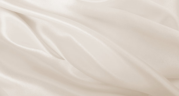 光滑优雅的金色丝绸或缎面奢华布料纹理，用作婚礼背景。奢华背景设计。呈灰褐色调。复古风格图片下载