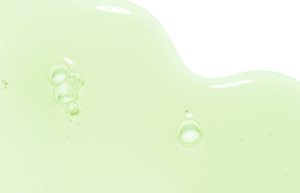 白色背景上的滴落凝胶精华图片下载