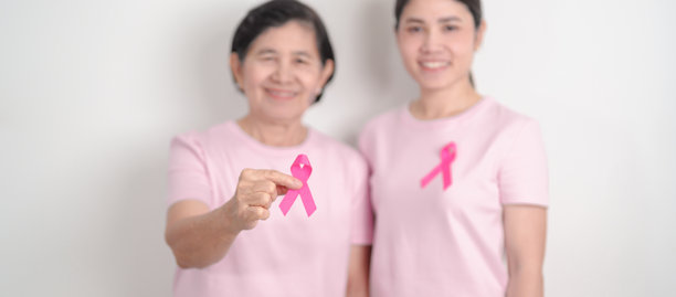 粉红丝带的女性伴侣，象征粉红十月乳腺癌防治月、五月女性健康、十一月父母领养、女性权利、赋权、三月国际妇女节和癌症日图片下载