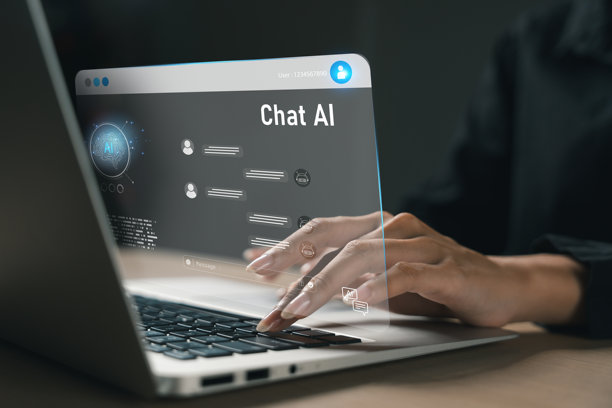 笔记本电脑屏幕上的AI聊天机器人界面，用户正在打字。人工智能、数字助理、机器学习和现代虚拟通信的概念。AI、聊天机器人、人工智能图片下载