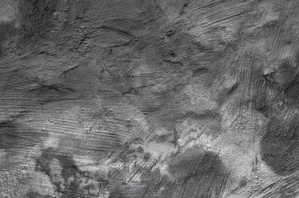 灰色背景，照片展示了混凝土墙和石膏的纹理图片下载