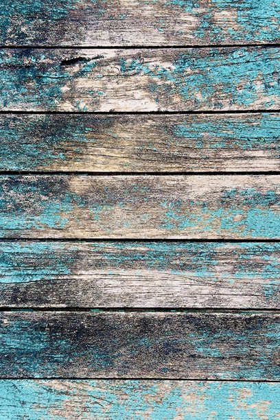 风化过的绿松石色木板，带有剥落的油漆和粗糙的纹理。质朴的做旧木材背景，非常适合复古设计、海滨主题、颓废风装饰或抽象背景。图片下载