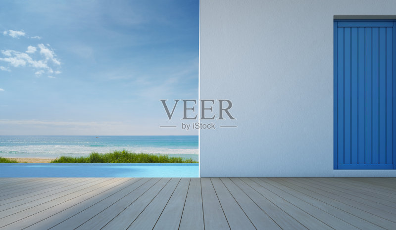 豪华海景游泳池在现代白色海滩房子正版图片素材