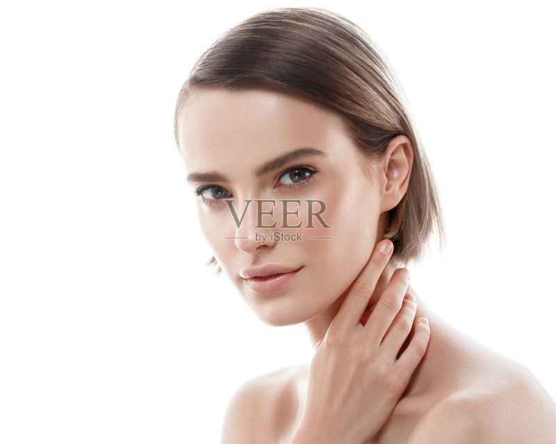 美丽女人的脸与完美的皮肤肖像。孤立在白色的。正版图片素材