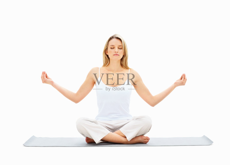 年轻的女士在白色的莲花位置沉思正版图片素材