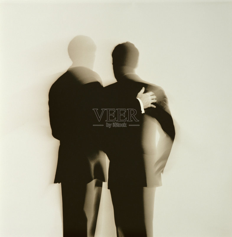 两个商人的抽象剪影背影正版图片素材