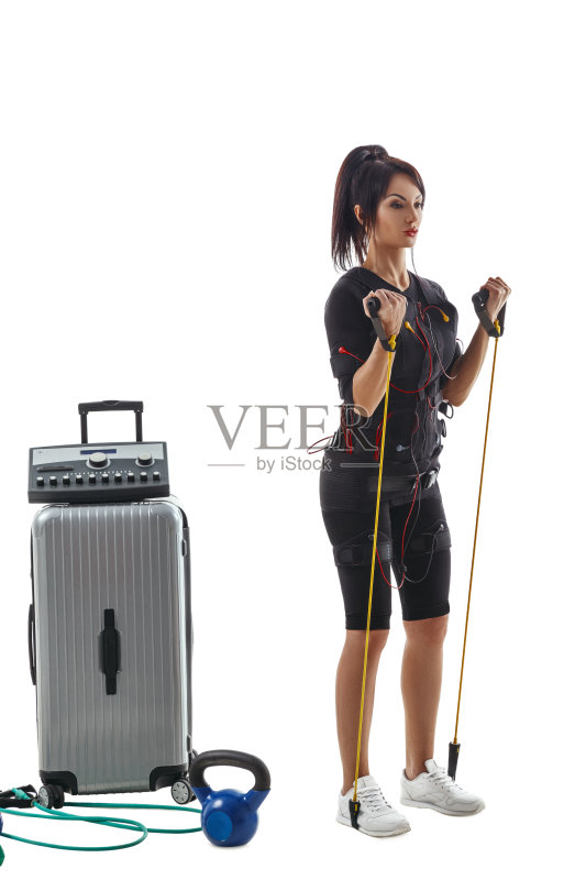 穿着急救服，带着扩音器做运动的女人正版图片素材