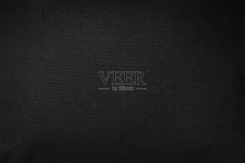 黑色织物纹理背景。深色纺织品的细节。正版图片素材
