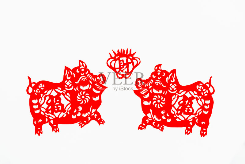 中式传统剪纸艺术图案：猪年吉祥元素照片摄影图片